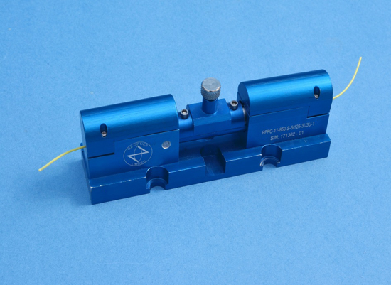 Photo of All Fiber Polarization Controller with 1 meter long 900um OD Hytrel jacketed 5/125 SM fiber pigtails and with angle FC/APC connectors. Operable from 780nm to 920nm