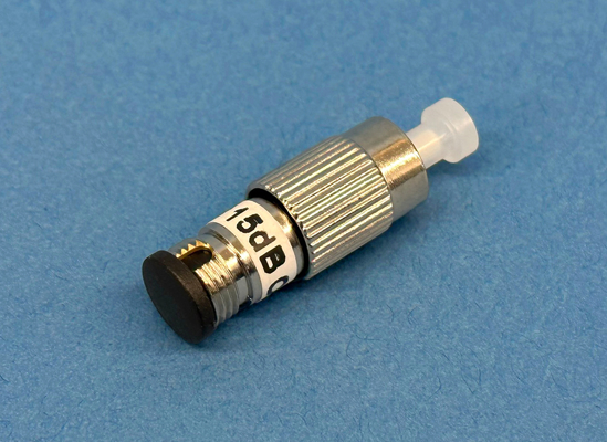 Close-up photo of a Plug type, singlemode 15dB fixed attenuator at 1300/1550nm with male to female FC/Ultra PC connector